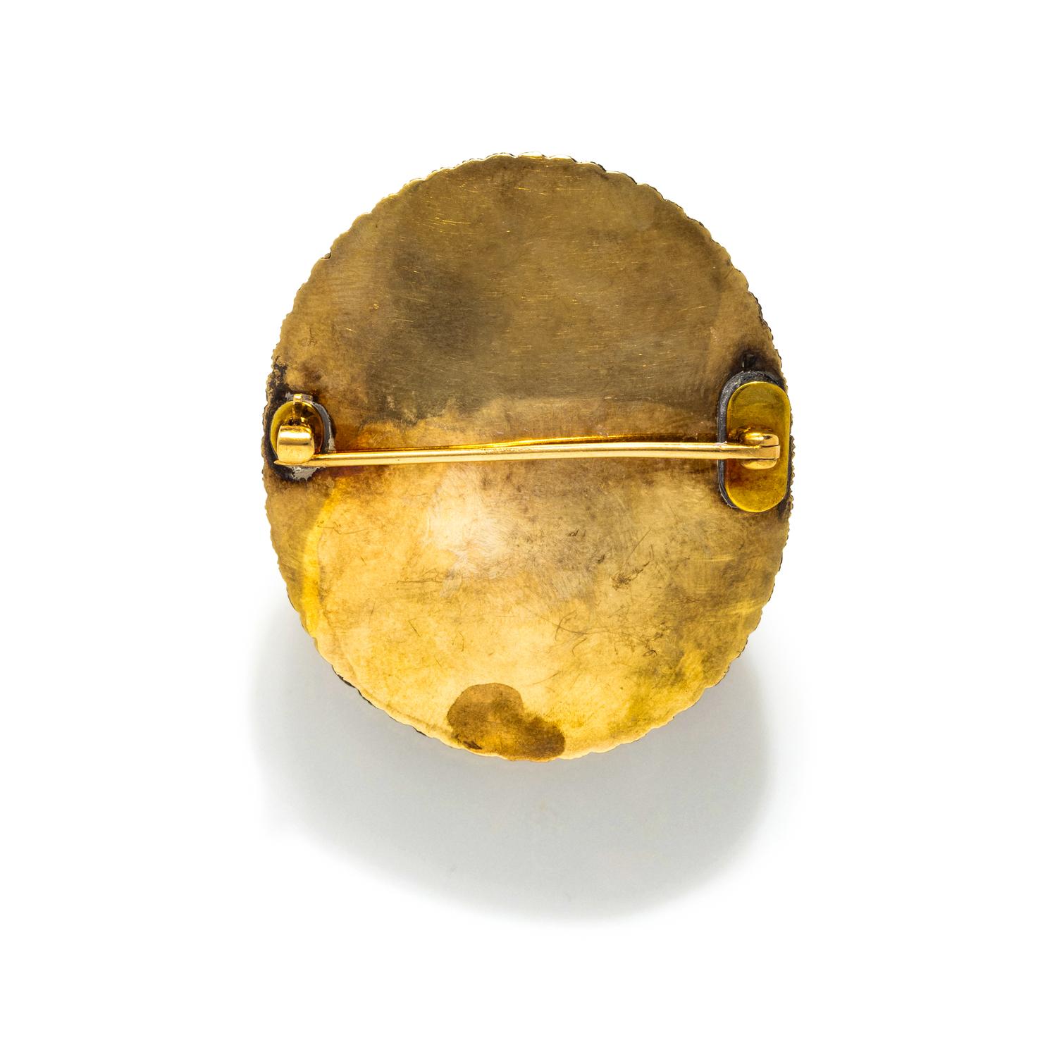 YELLOW GOLD, SEED PEARL, AND HARDSTONE CAMEO BROOCH