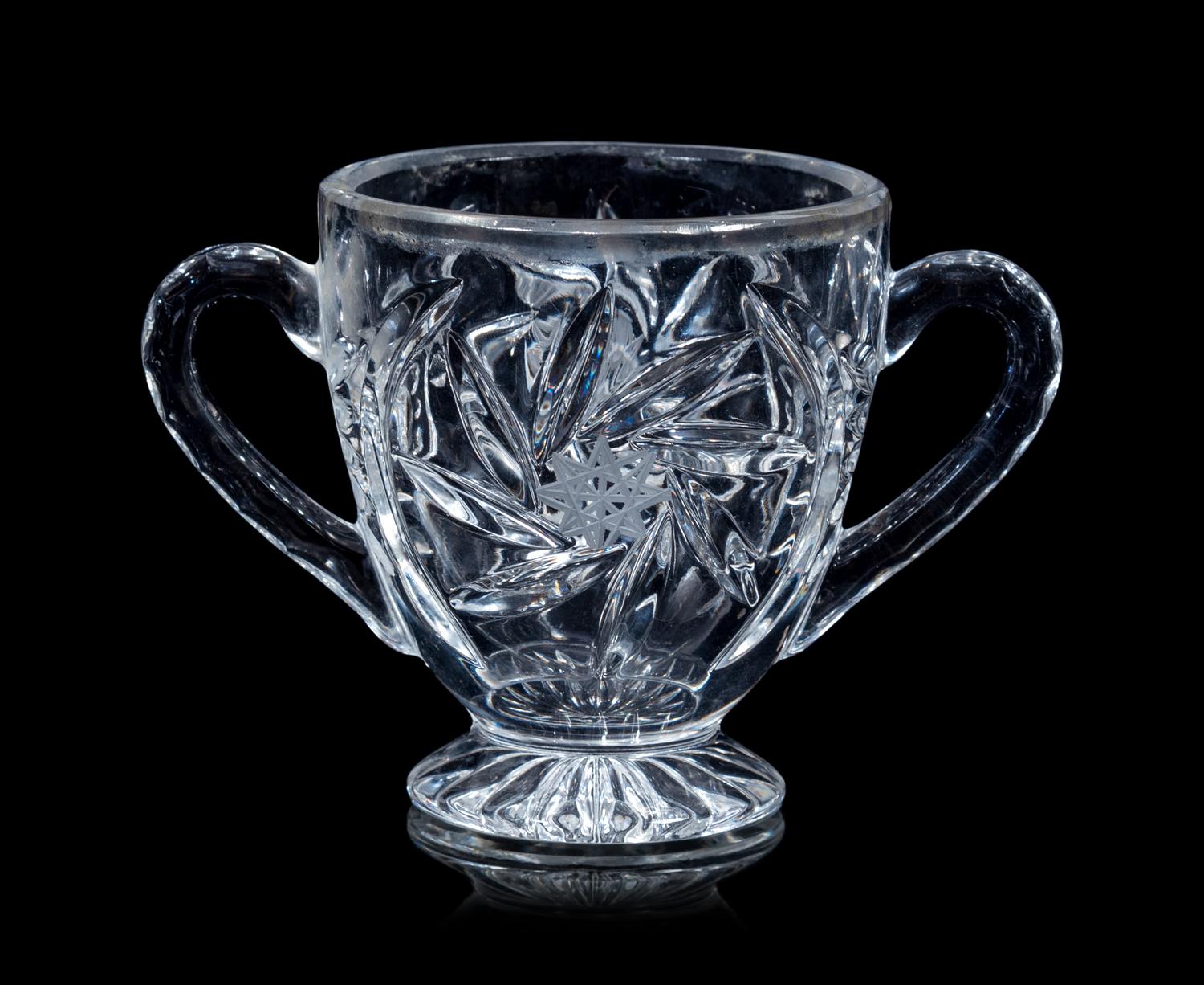 A Group of Eleven Cut and Molded Glass Serving Articles