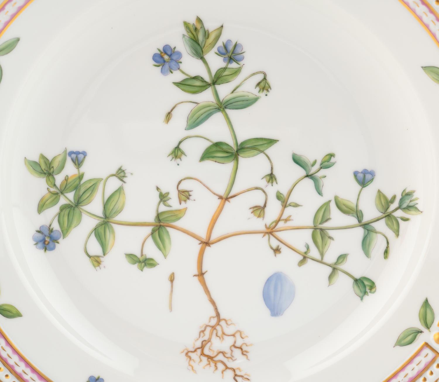 A Set of Eight Royal Copenhagen Flora Danica Porcelain Dinner Plates