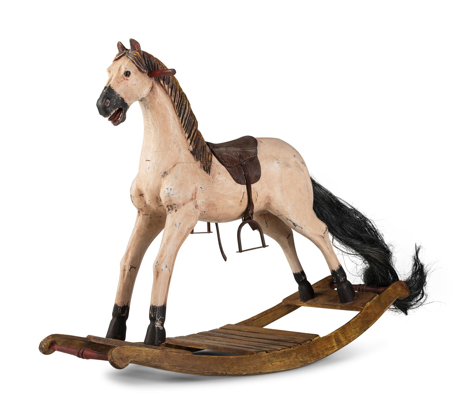 A Carved and Painted Wooden Rocking Horse