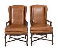 A Pair of Régence Style Leather-Upholstered Wingback Fauteils
