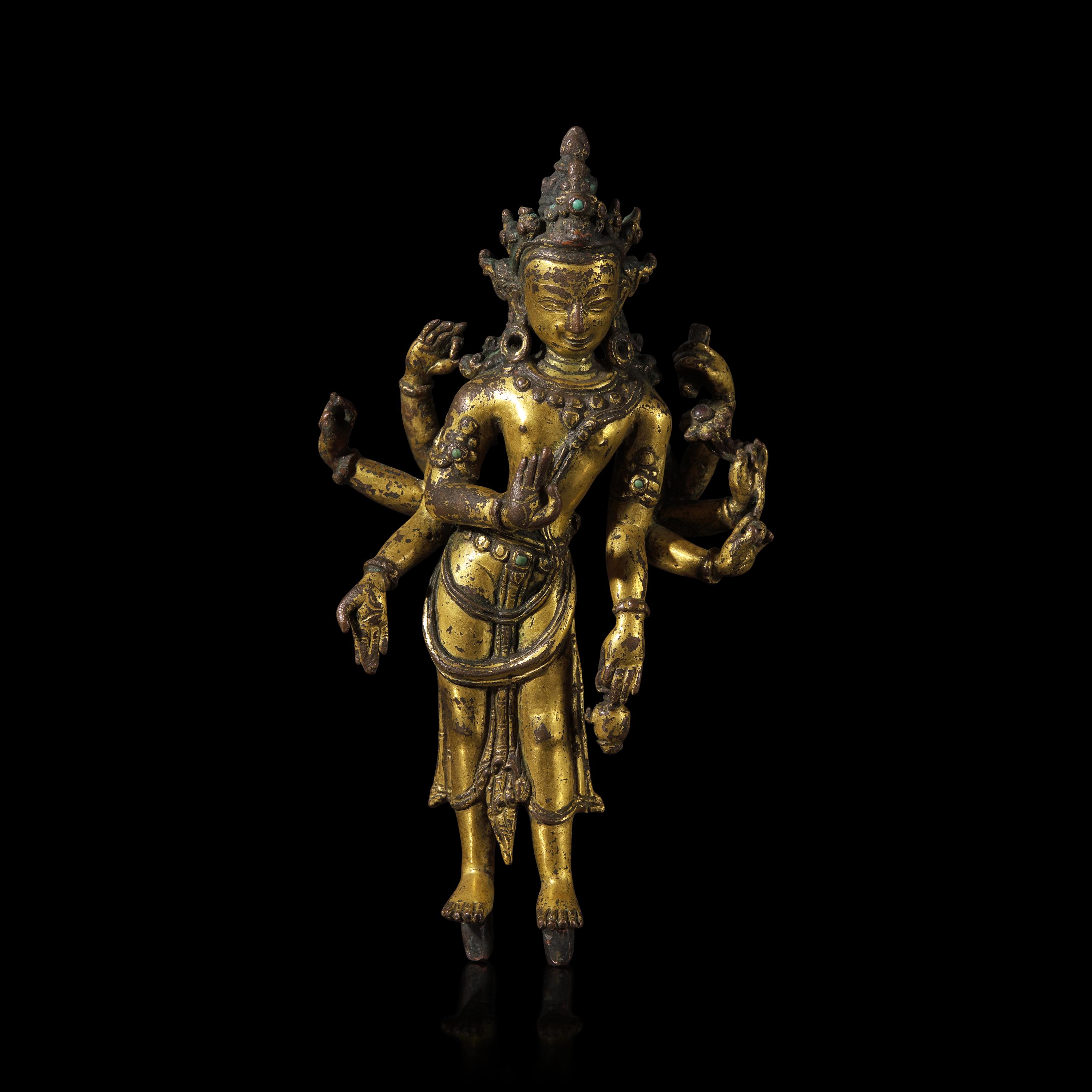 A Nepalese Gilt Bronze Standing Figure of Avalokiteshvara, 14th/15th Century 十四/十五世紀 尼泊爾銅鎏金菩薩立像