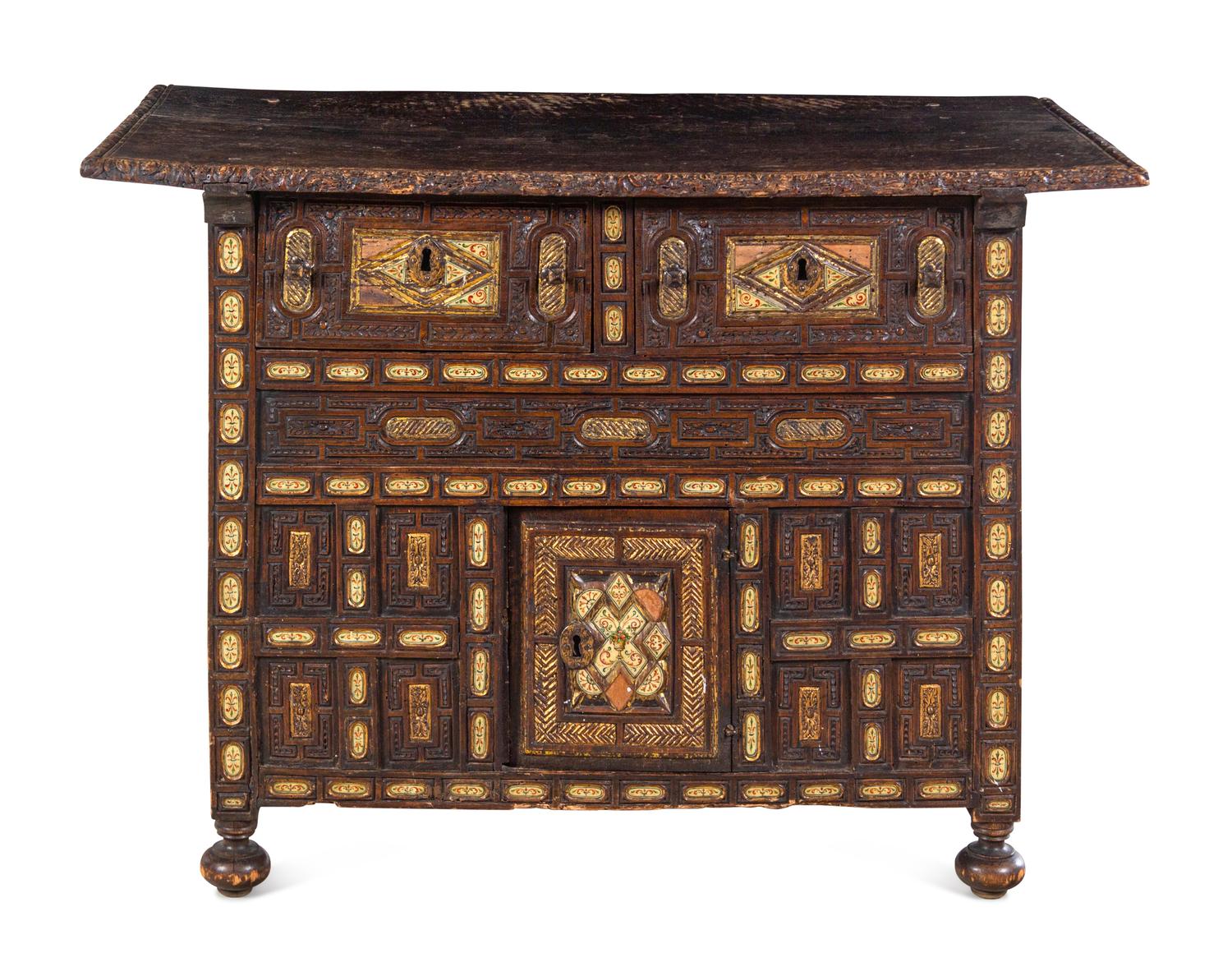 A Spanish Baroque Carved and Painted Walnut Chest