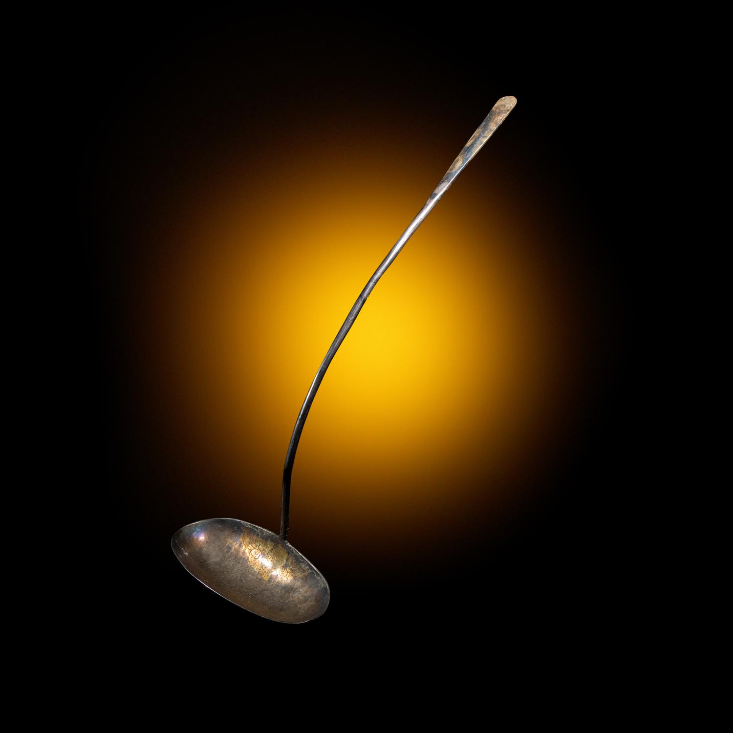 A Chinese Parcel-Gilt Silver 'Peony' Ladle, Liao Dynasty 遼 銀局部鎏金牡丹紋長勺