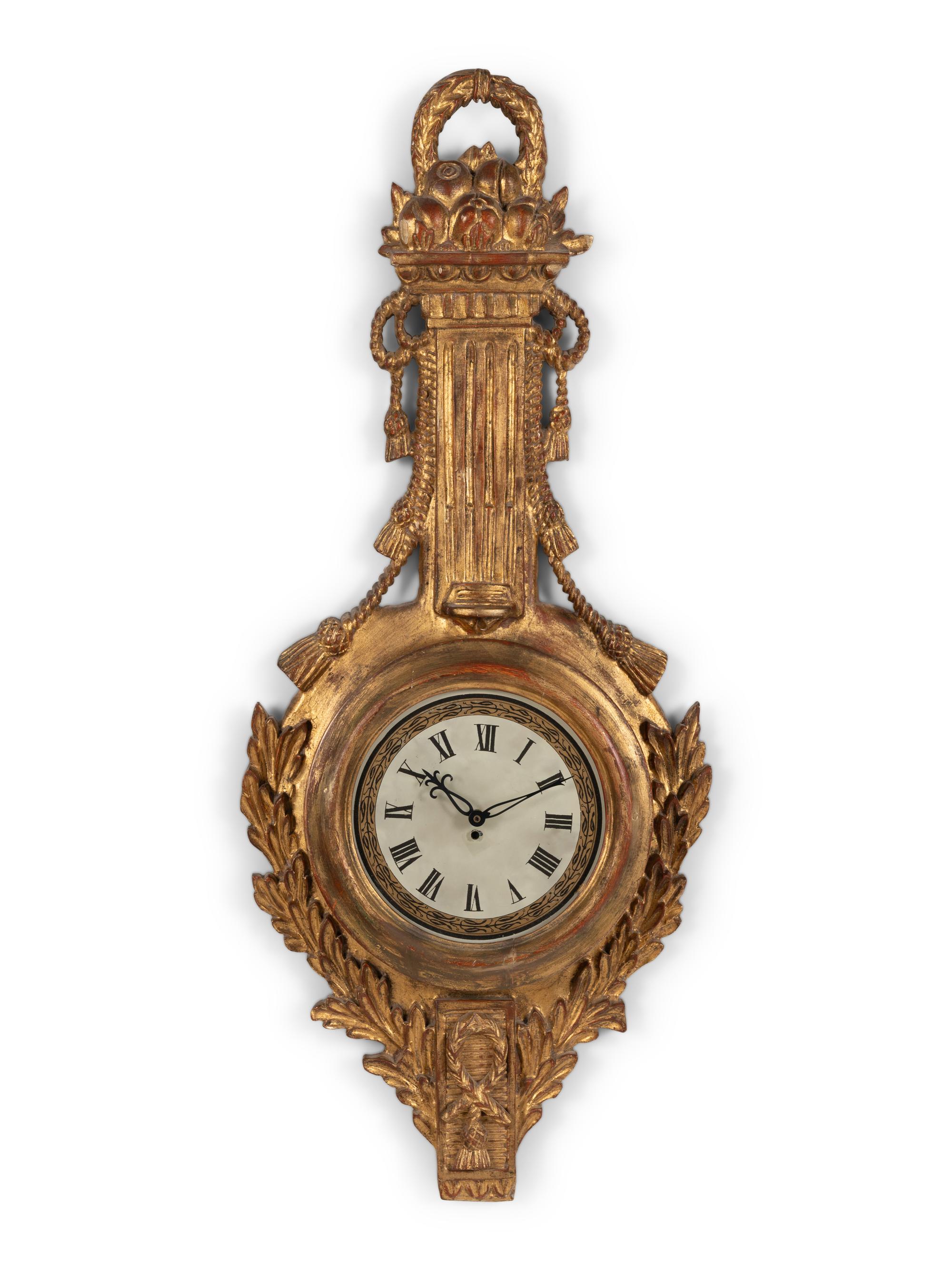 A Louis XVI Style Giltwood Cartel Clock