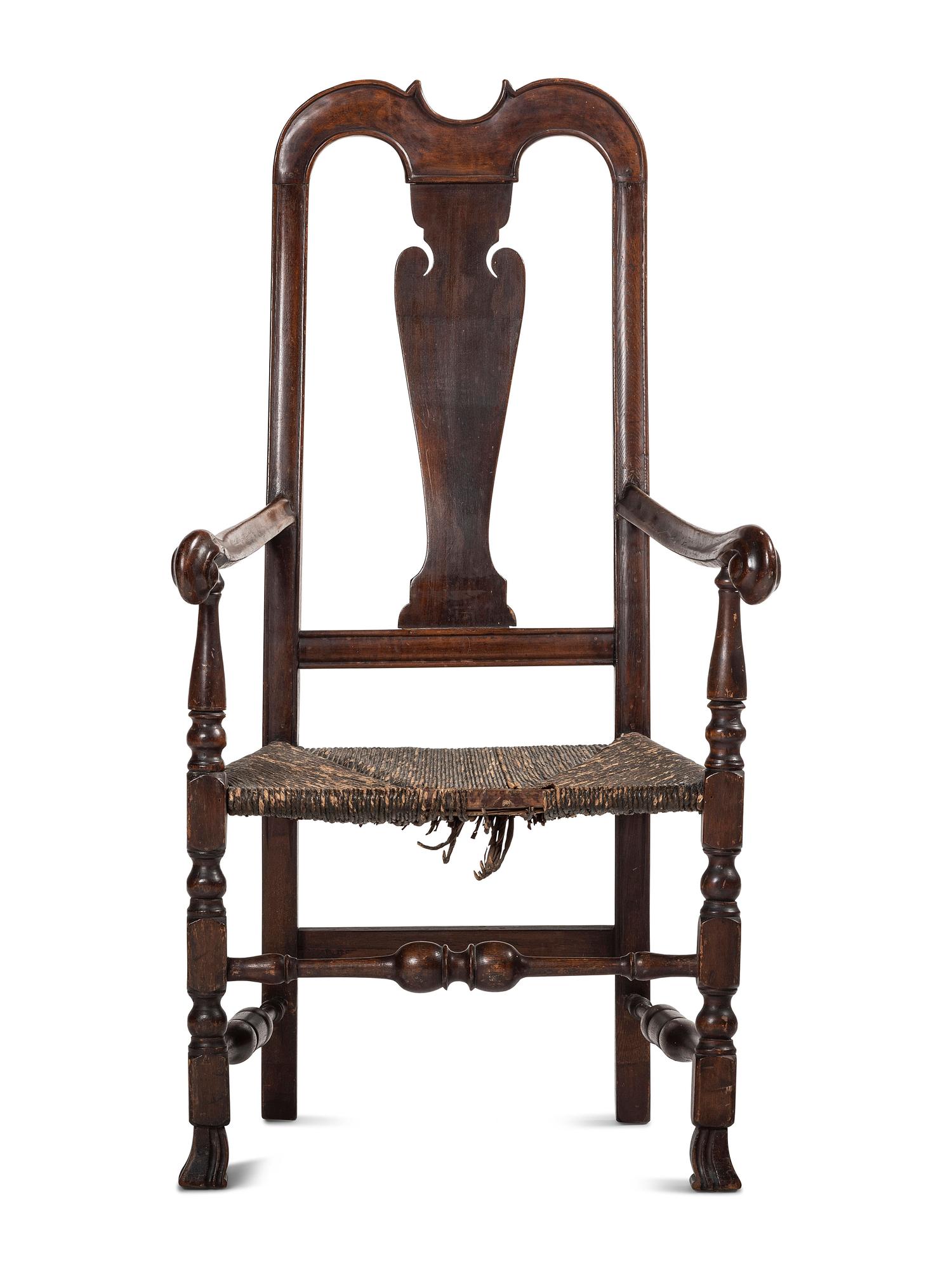 A Queen Anne Mixed Woods Rush-Seat Spanish-Foot Armchair