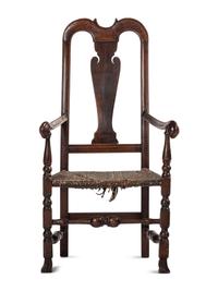 A Queen Anne Mixed Woods Rush-Seat Spanish-Foot Armchair