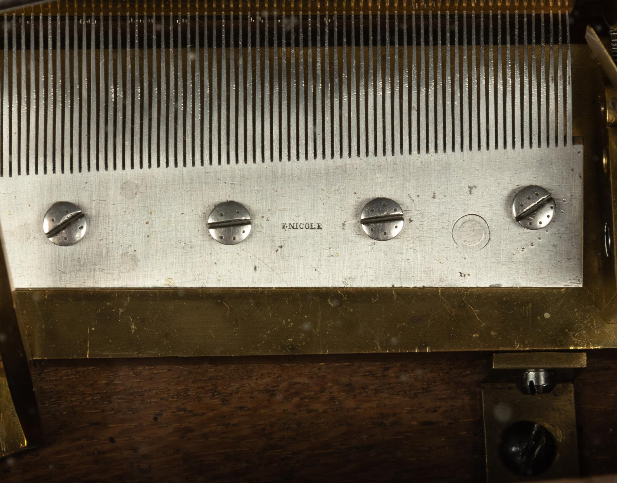 A Rare "Rigid Notation" Musical Clock Base