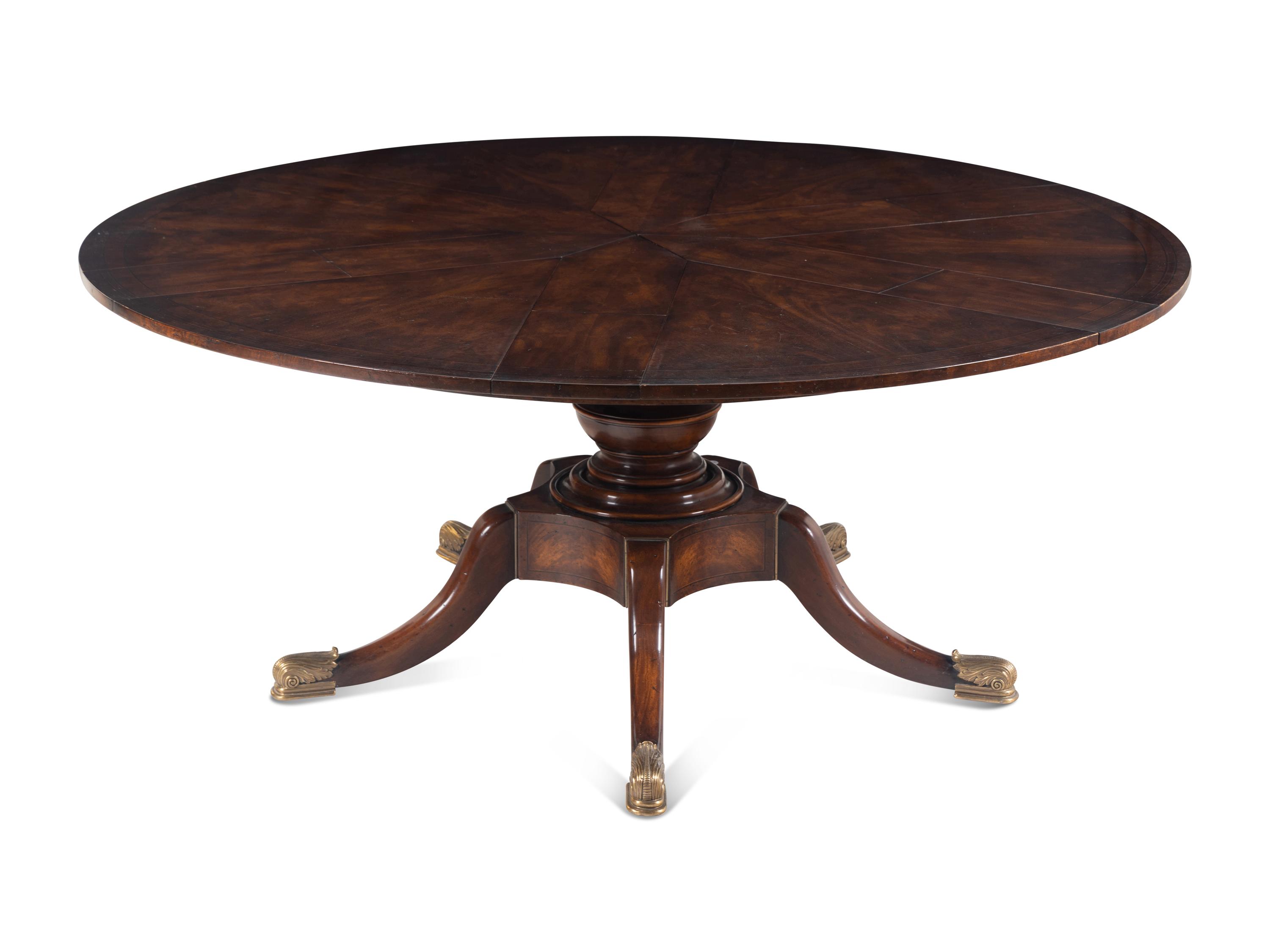A Regency Style Rosewood and Burlwood Cross-Banded Mahogany Jupe Dining Table