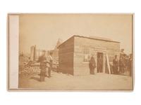 [EARLY PHOTOGRAPHY] -- [CHICAGO]. SHAW, William, photographer. CDV of first house built following the Chicago fire. [Chicago, IL]: 1871.