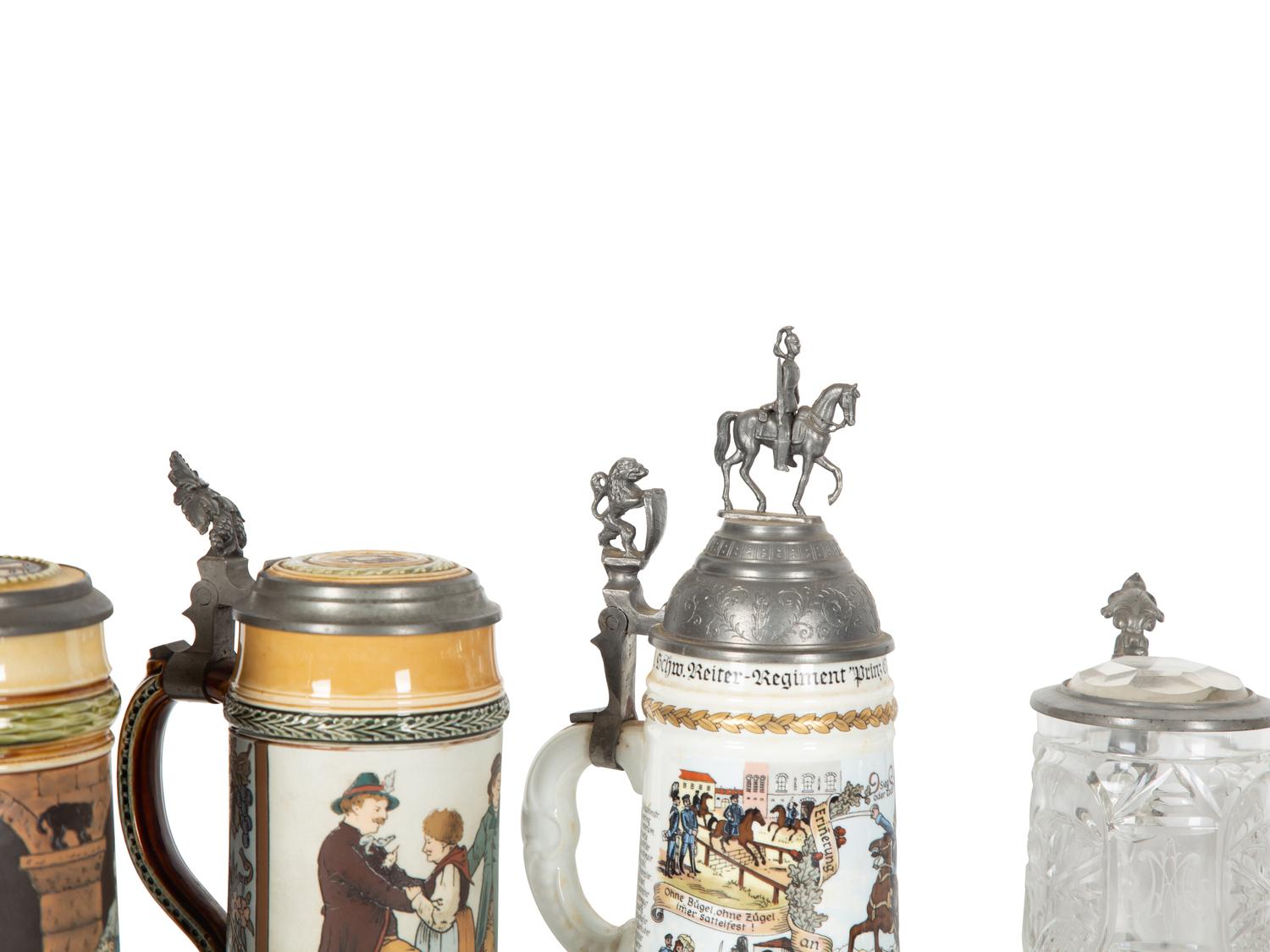 A Collection of German Pewter Mounted Steins