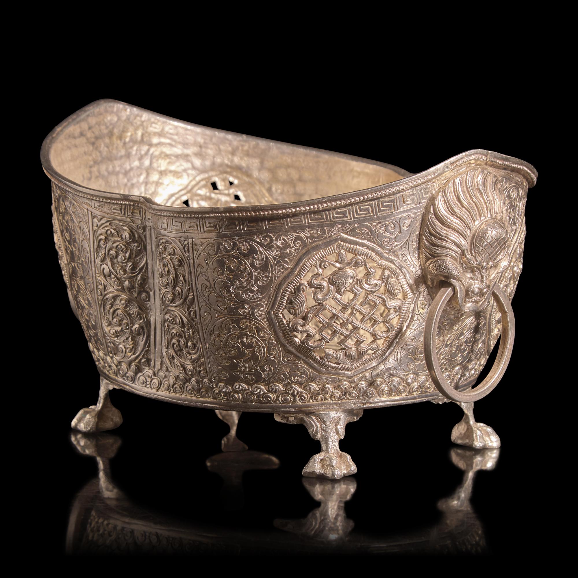 A Chinese or Southeast Asian Silver Alloy Navette-Form Reticulated Footed Bowl — 東南亞銀合金鏨花碗