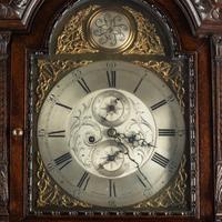 An English Carved Oak Tall Case Clock