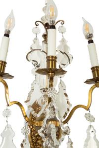 A Pair of Louis XV Style Gilt Bronze and Cut Glass Three-Light Sconces