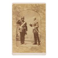 [Indian Wars]. Cabinet card of militiamen, possibly from the 4th Infantry Band by Charles Howard, Fort Sanders, WY.