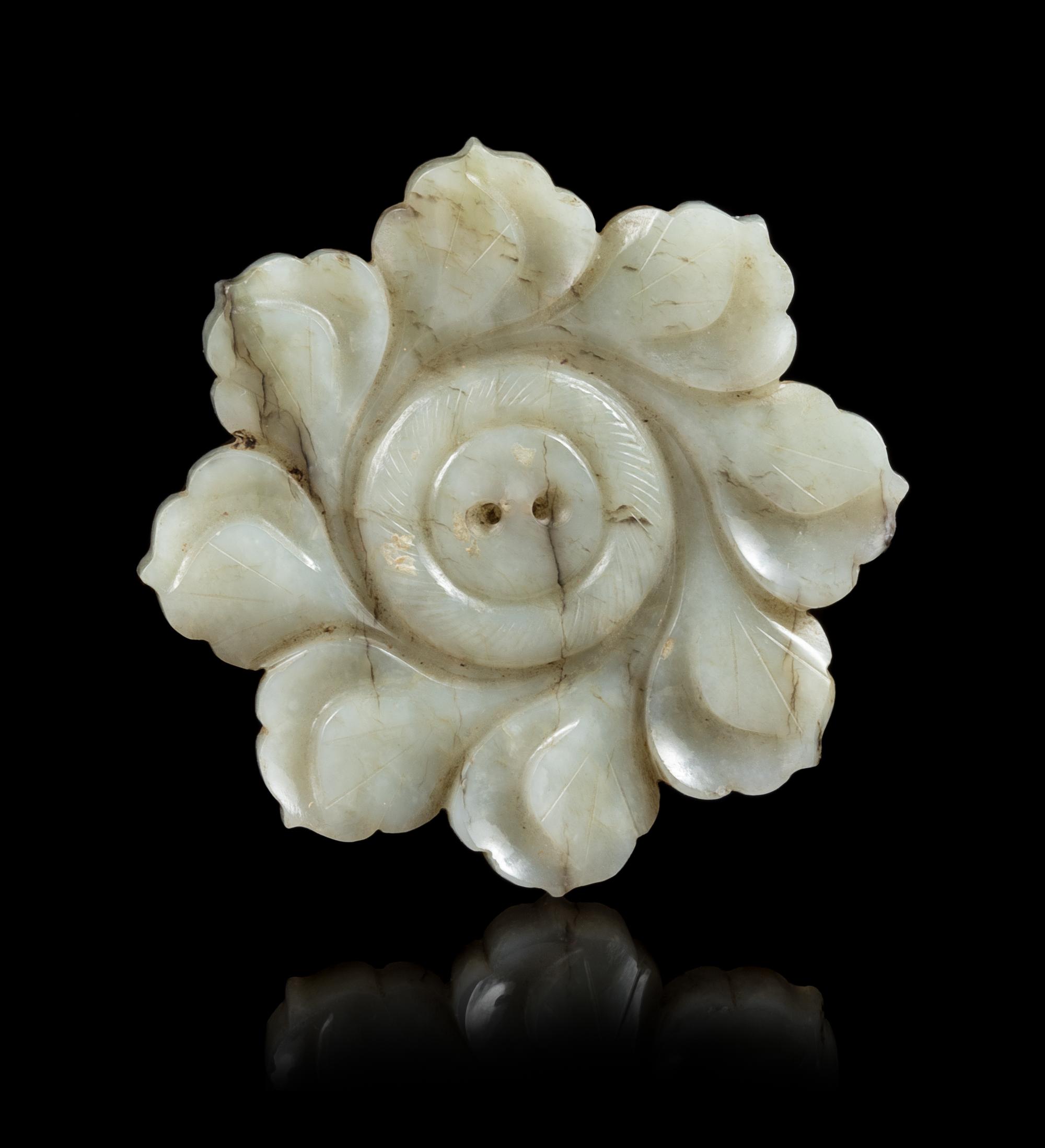 A Grey Jade Mughal Style 'Flower' Plaque Diameter 2 5/8 inches. — 17TH CENTURY