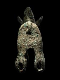 A Luristan Bronze Cow with Four Sphere Feet