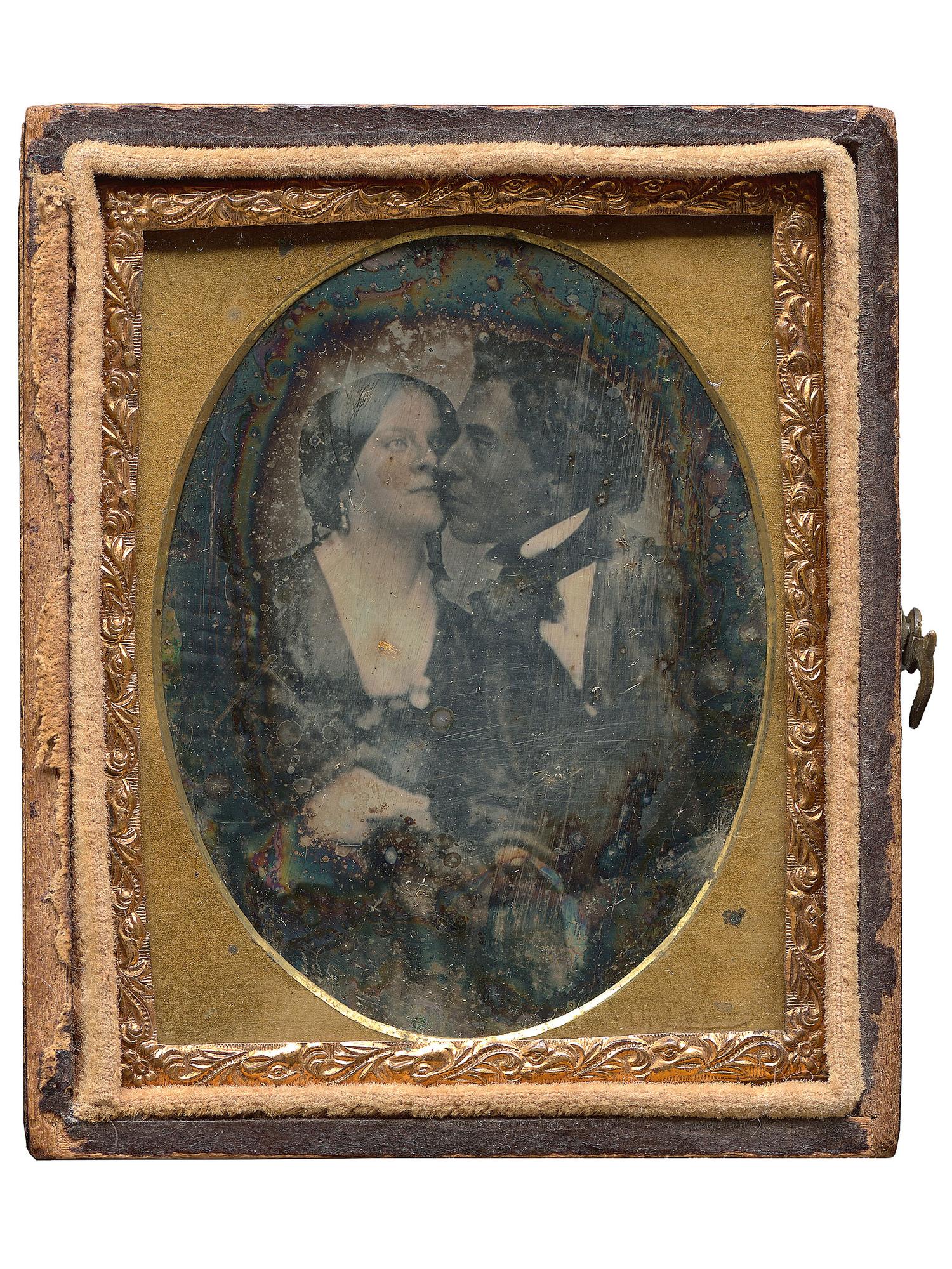 [EARLY PHOTOGRAPHY]. A remarkable ninth plate daguerreotype of an interracial couple.