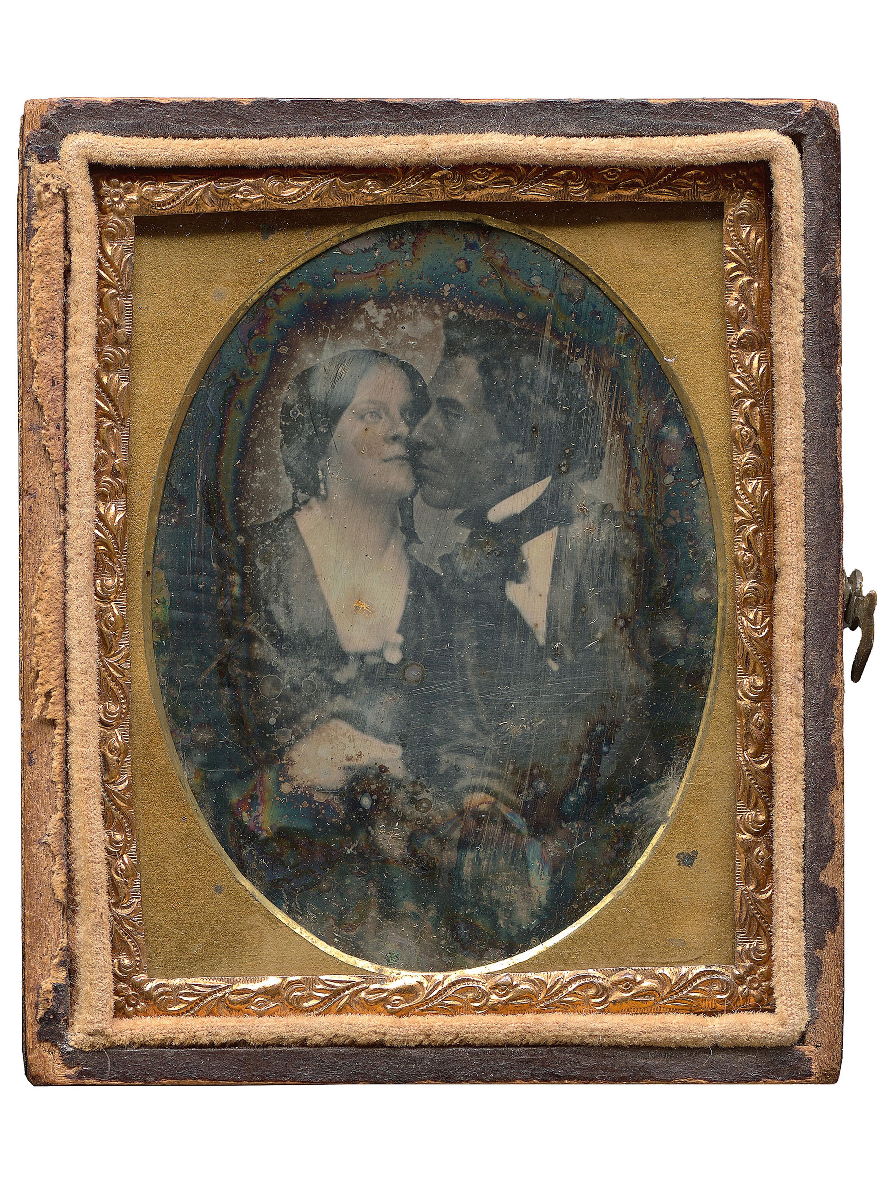 [EARLY PHOTOGRAPHY]. A remarkable ninth plate daguerreotype of an interracial couple.