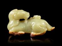A Celadon and Russet Jade Horse