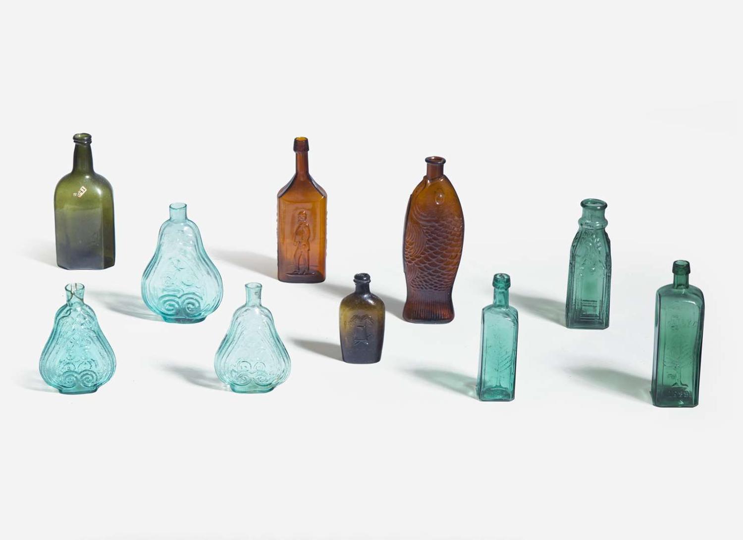 A collection of ten mold-blown colored glass bottles, various makers, 19th century