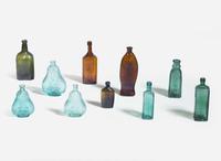 A collection of ten mold-blown colored glass bottles, various makers, 19th century