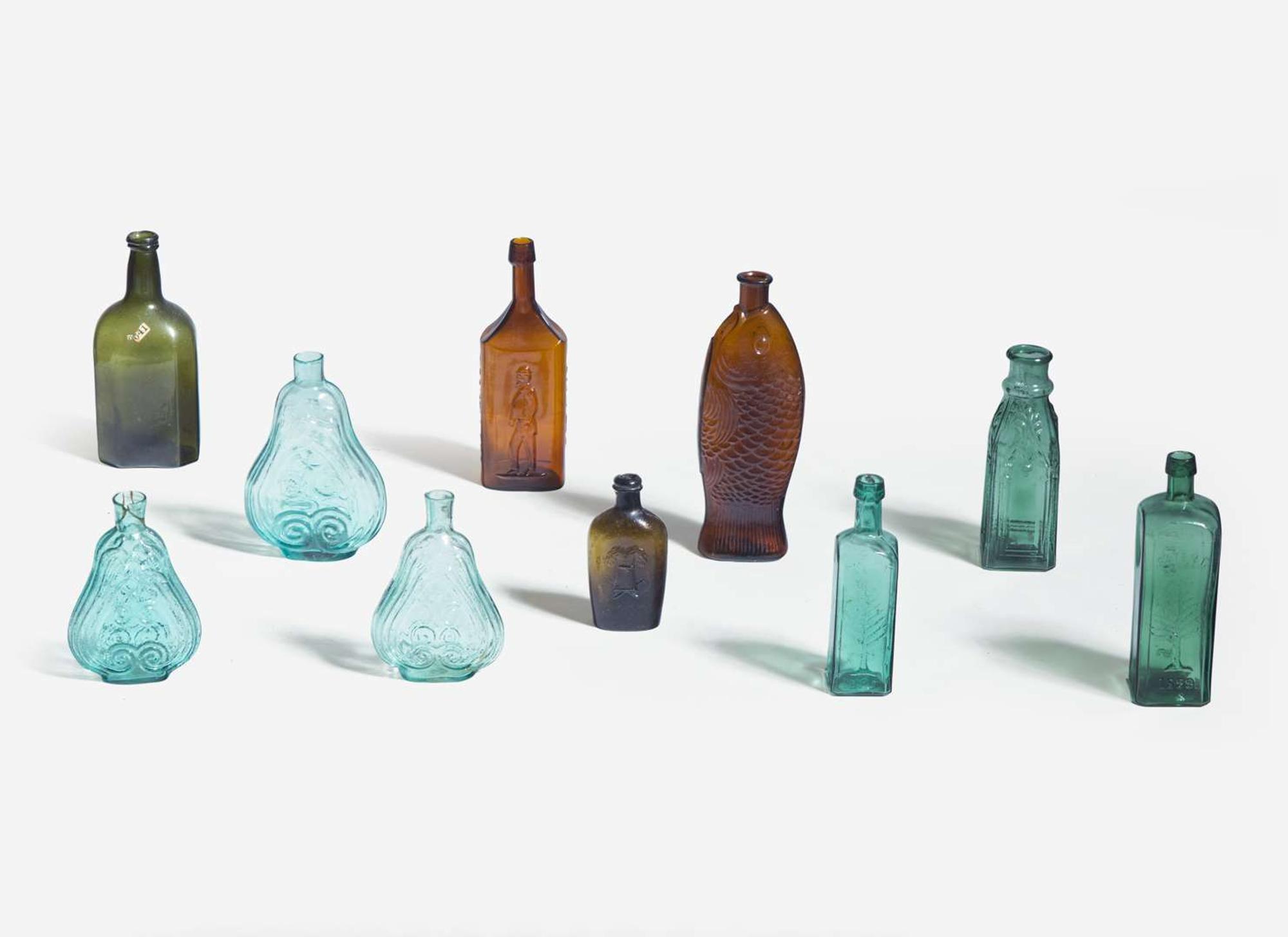 A collection of ten mold-blown colored glass bottles, various makers, 19th century