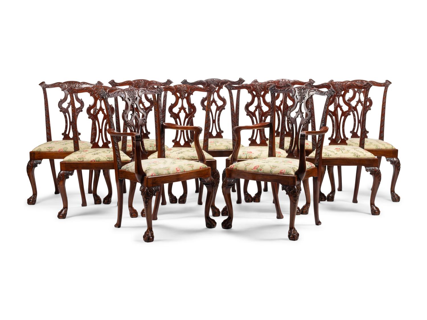 A Set of Fourteen George III Style Carved Mahogany Dining Chairs