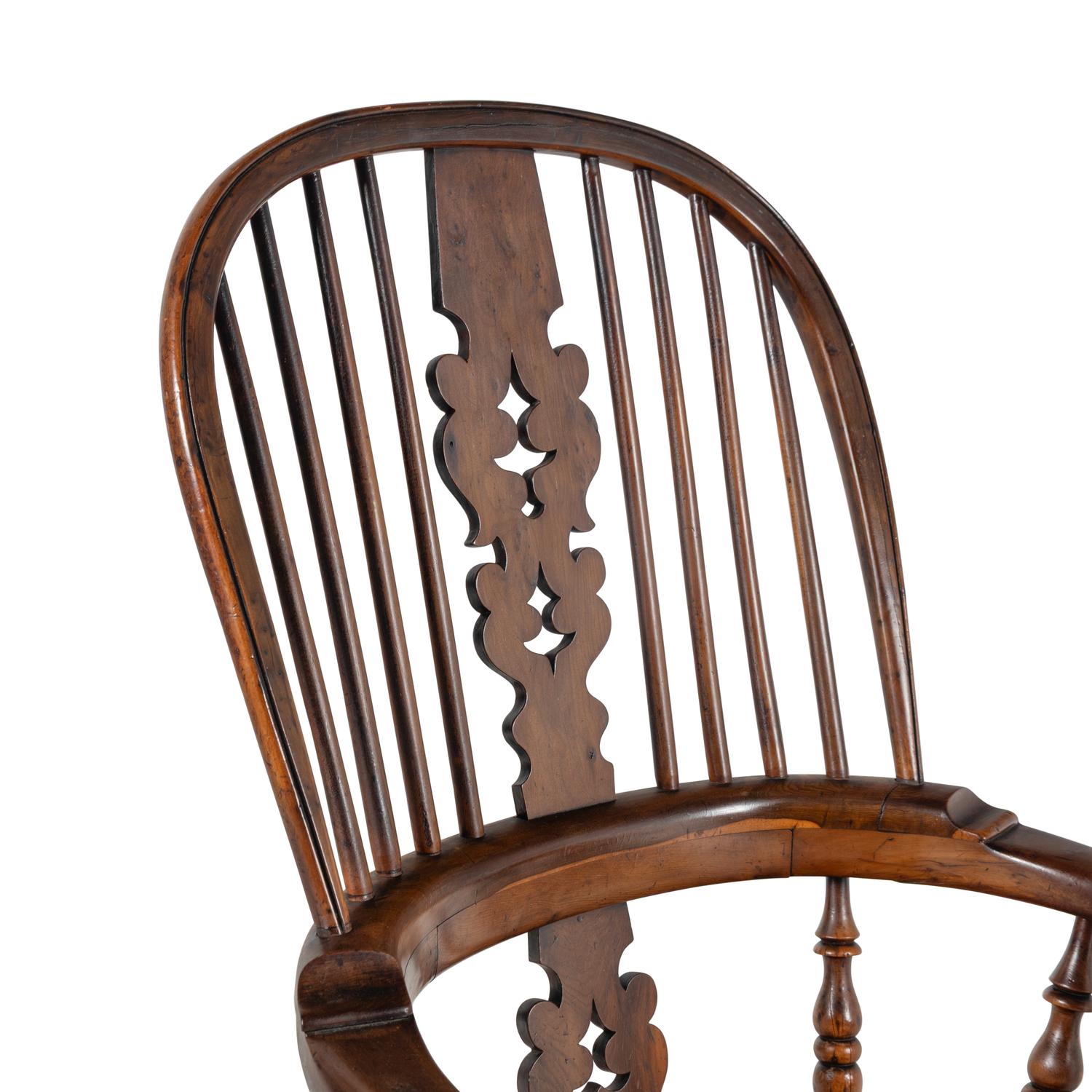 A Set of Nine English Yew and Elm Windsor Armchairs