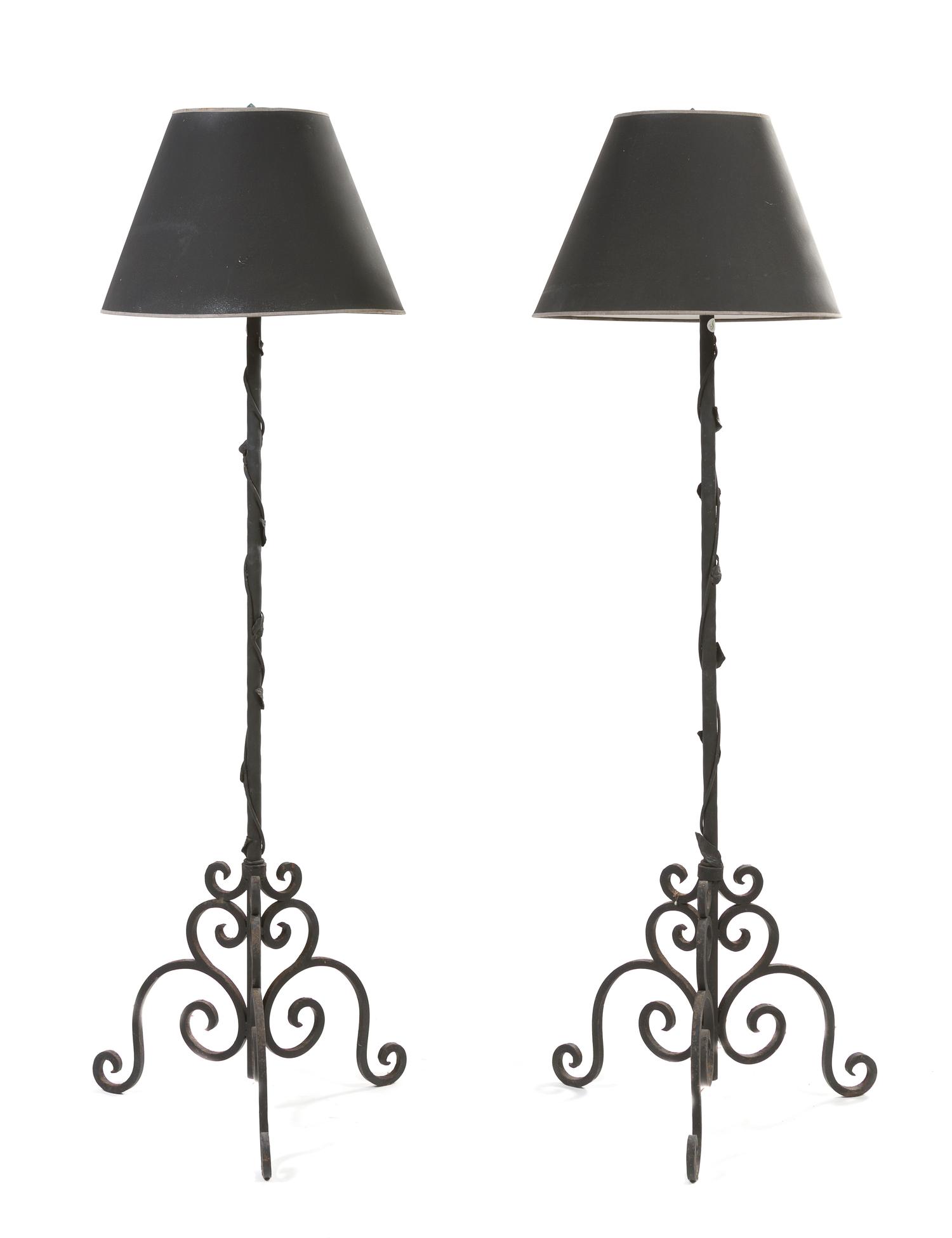 A Pair of Iron Torchieres, Height 74 1/2 inches.