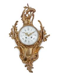 A Louis XVI Style Gilt Bronze Cartel Clock