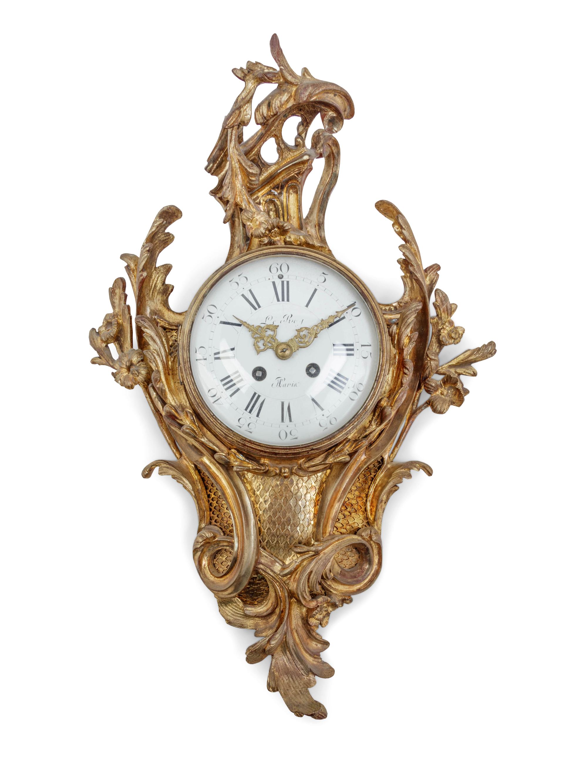 A Louis XVI Style Gilt Bronze Cartel Clock