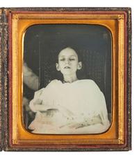 [EARLY PHOTOGRAPHY]. Sixth plate postmortem daguerreotype of a child sitting in a chair.