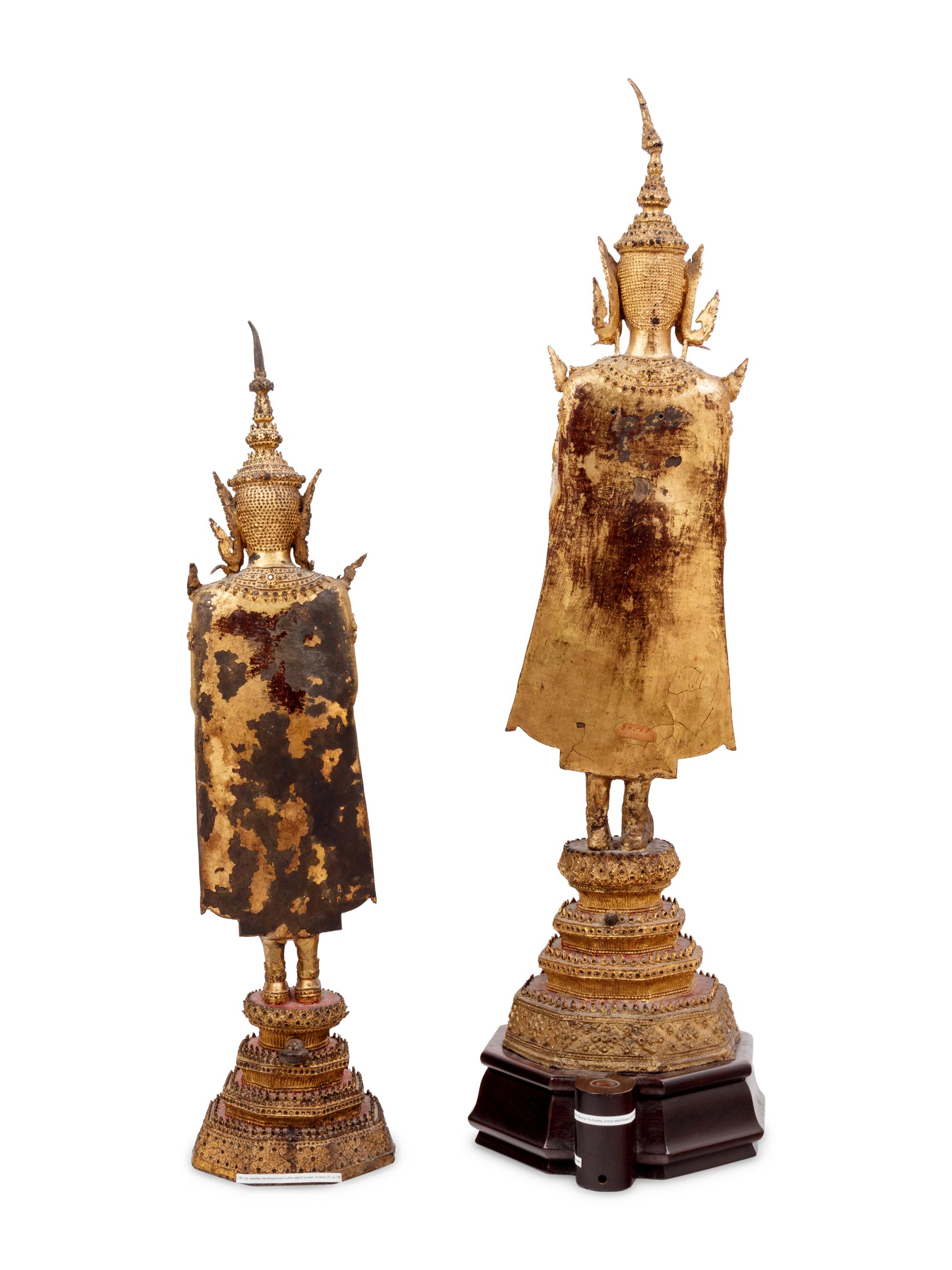 Two Thai Gilt Bronze Figures of Standing Buddha