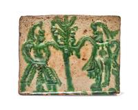 An English Glazed Earthenware Fireplace Tile Molded with Figures of Adam and Eve, 17th / 18th Century