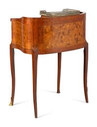 A Louis XV/XVI Transitional Style Gilt Metal Mounted Parquetry Writing Table