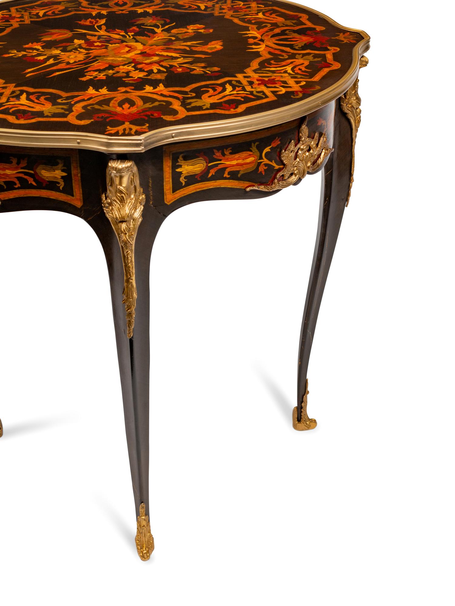 A Pair of Louis XV Style Gilt-Bronze-Mounted Marquetry Tables de Milieu