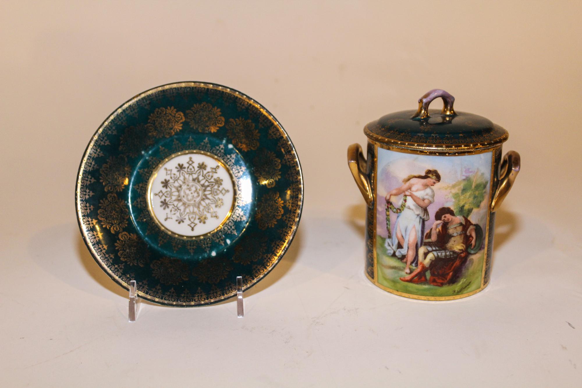 An Austrian Porcelain Painted Covered Jar Height overall 5 1/2 inches.