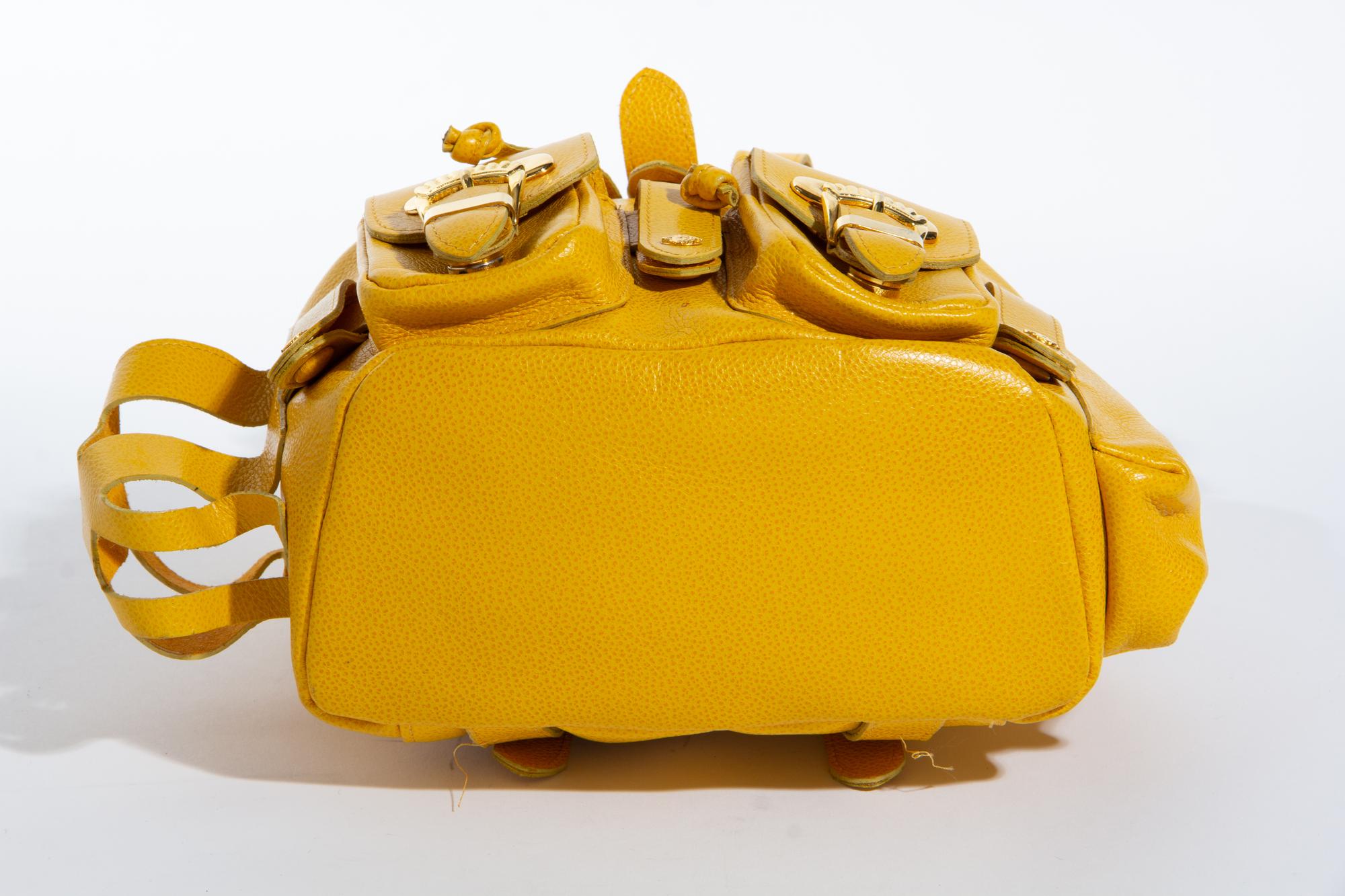 A Gianni Versace Yellow Leather Small Backpack, 9" x 8" x 3".