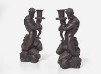 A Pair of Wedgwood Black Basalt Triton Figural Candlesticks, UK, 1973