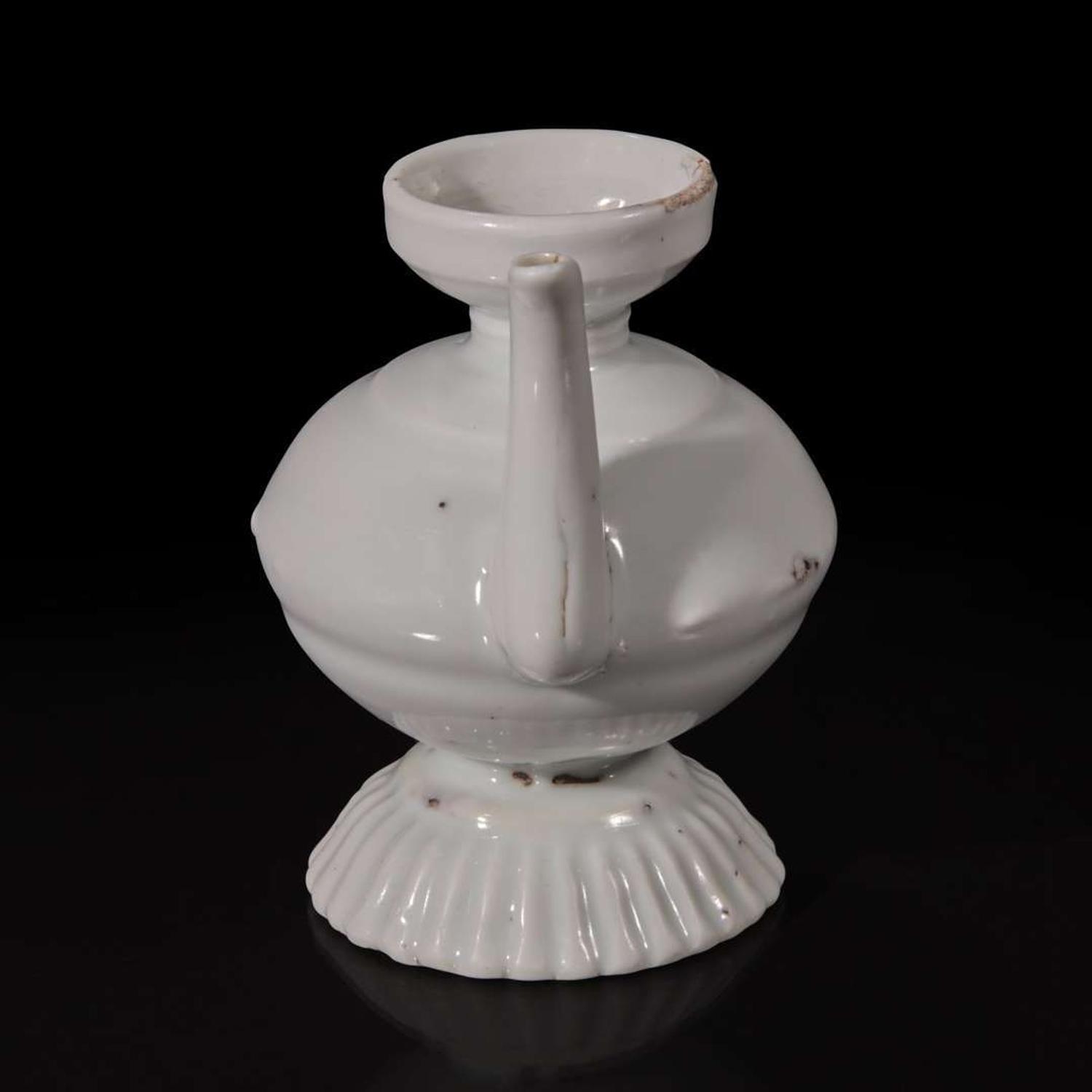 A small Chinese white glazed porcelain ewer Ming dynasty or earlier