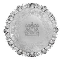 A George II Silver Salver, David Willaume II, London, 1744, having a rocaille and S-scroll decorated rim, the center with and engraved