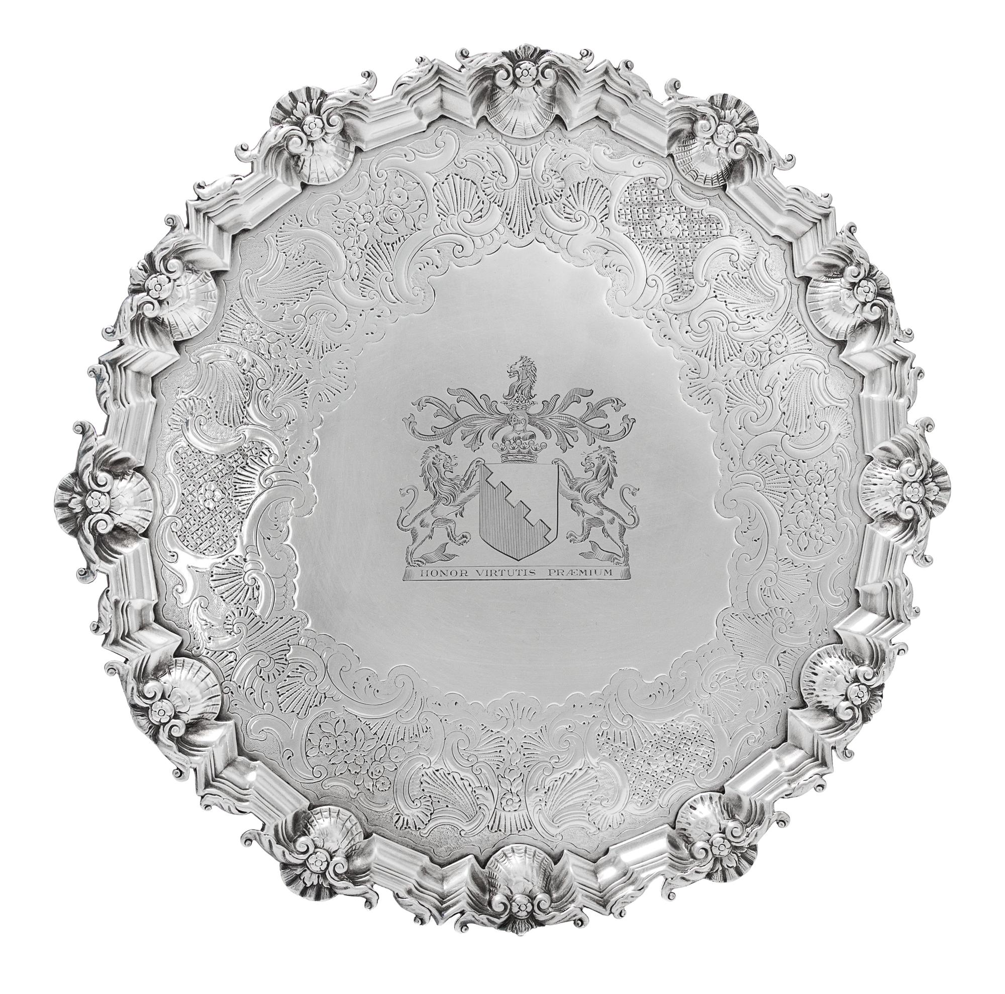 A George II Silver Salver, David Willaume II, London, 1744, having a rocaille and S-scroll decorated rim, the center with and engraved