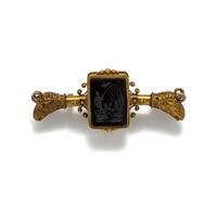 ANTIQUE, GILT AND CARVED INTAGLIO BROOCH