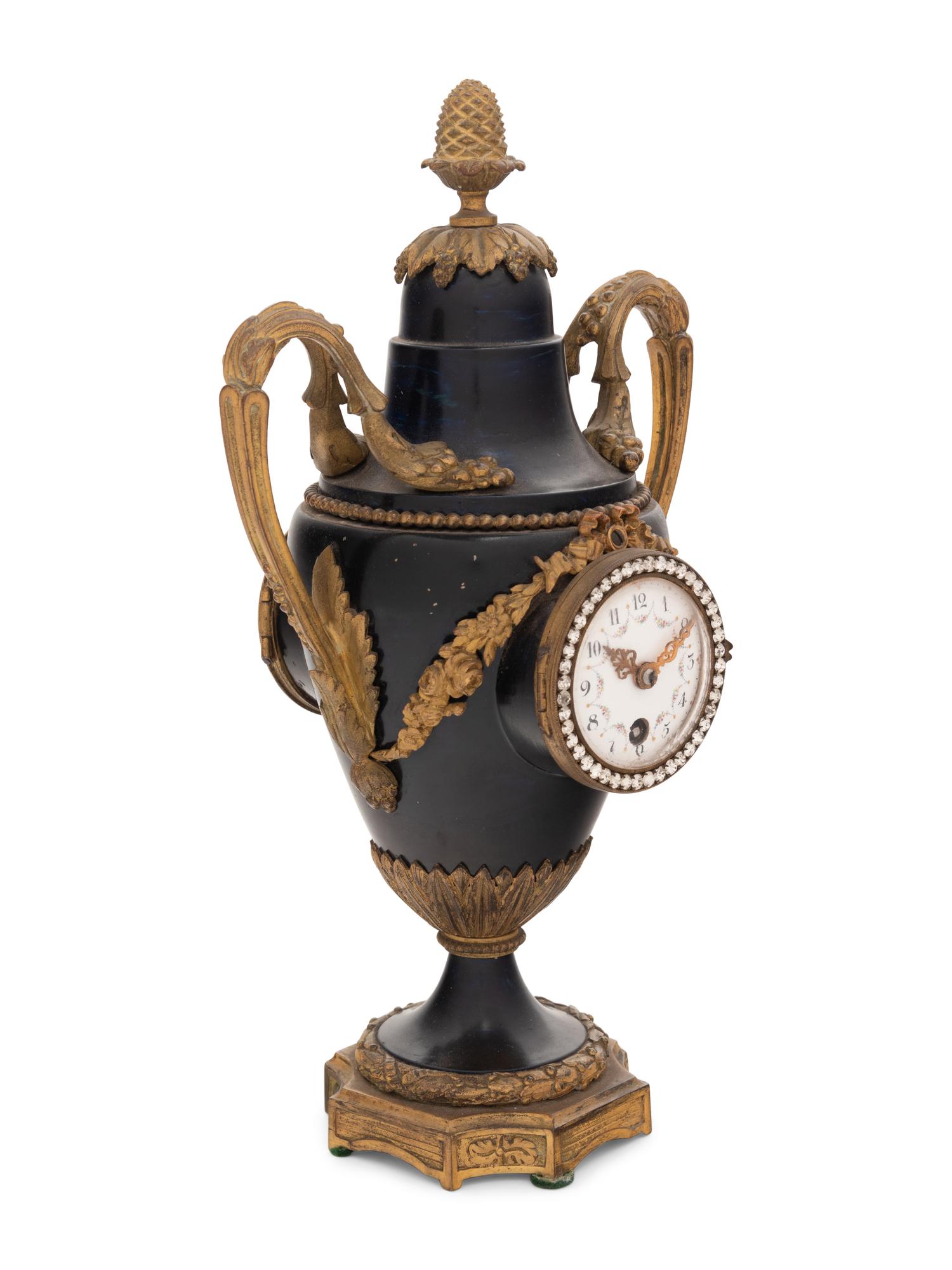 A French Gilt Bronze and Painted Tôle Clock
