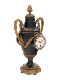 A French Gilt Bronze and Painted Tôle Clock