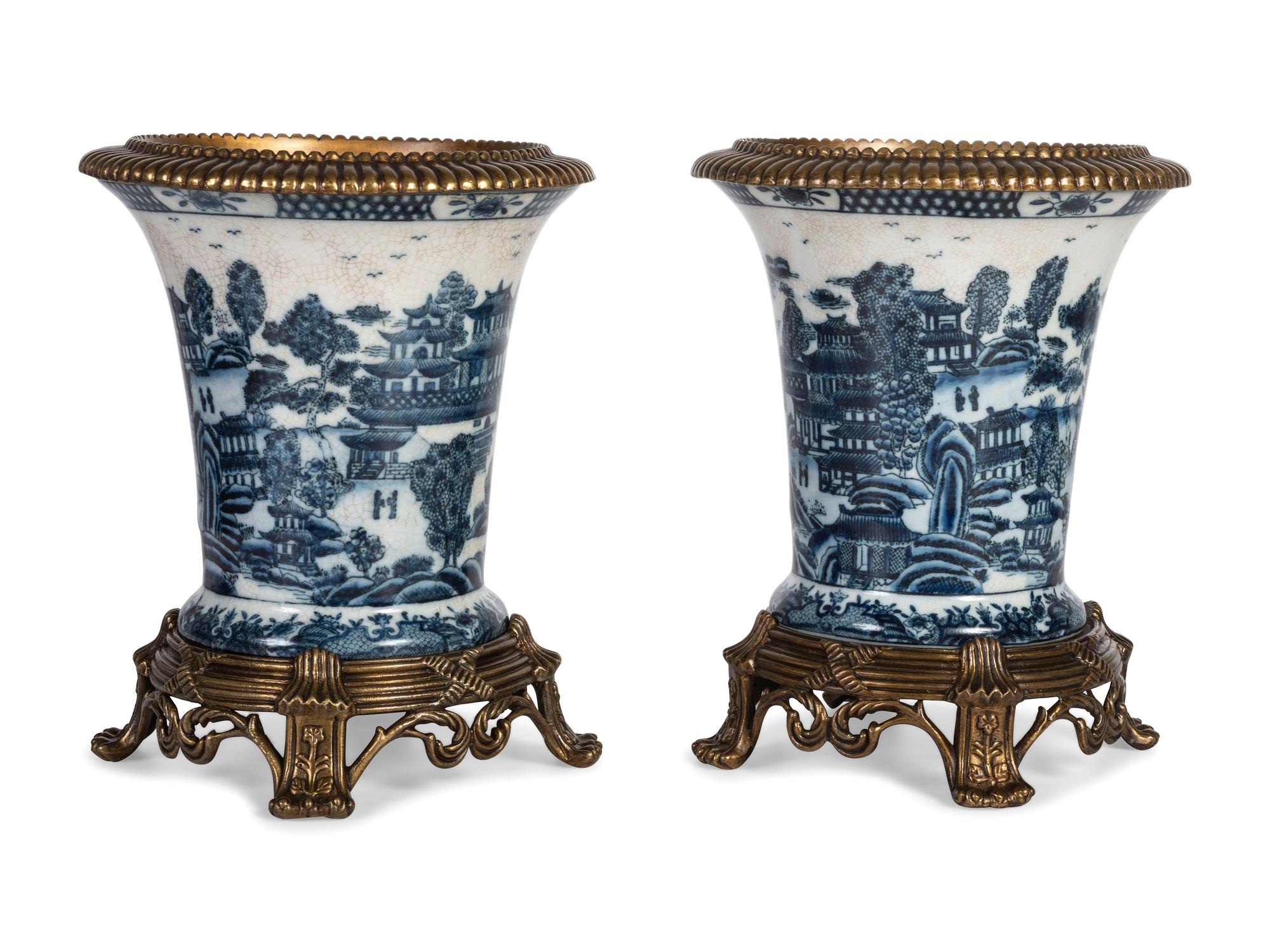 A Pair of United Wilson Gilt Metal Mounted Canton Style Porcelain Urns