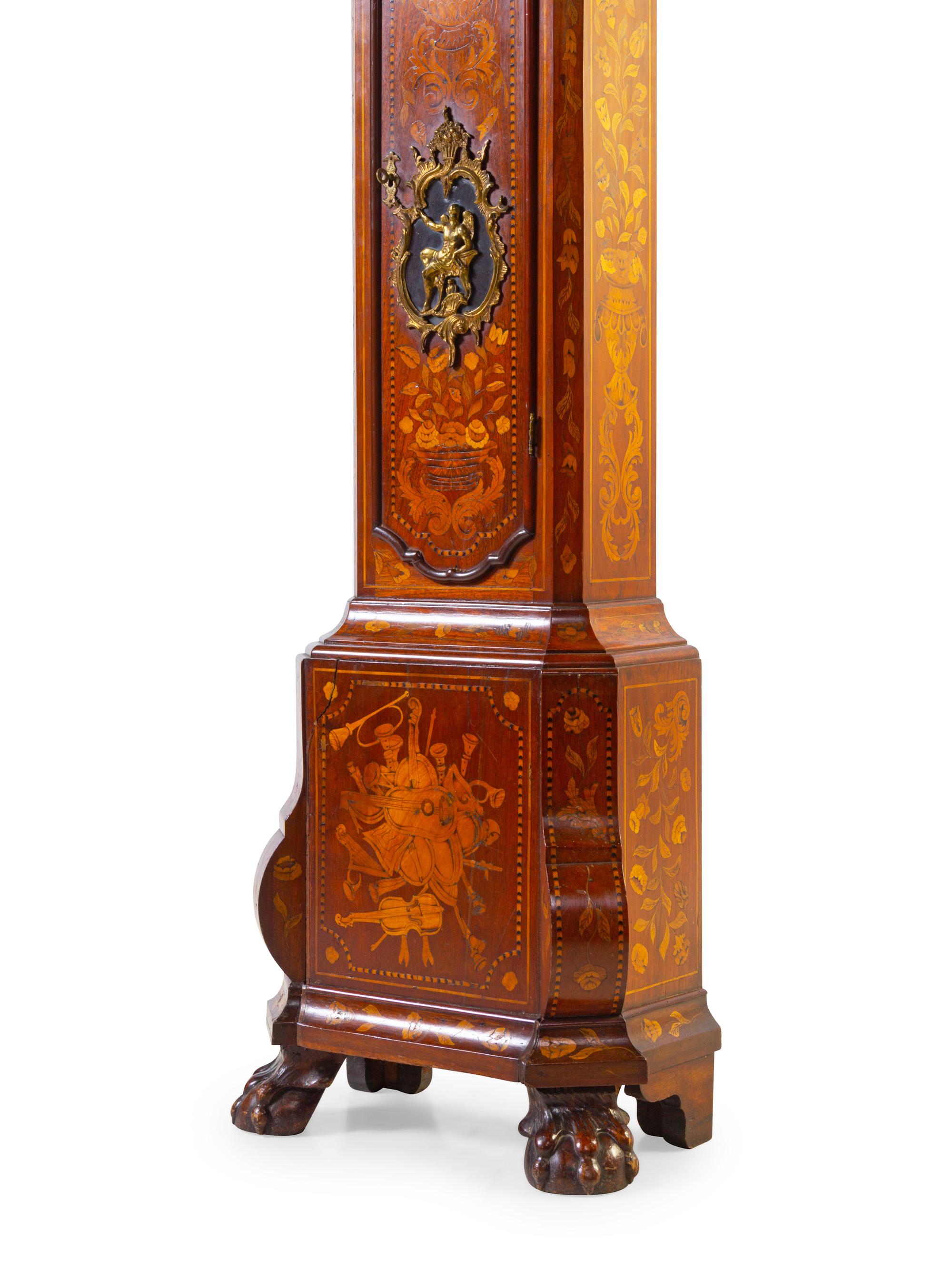 A Dutch Walnut and Marquetry Tall Case Clock