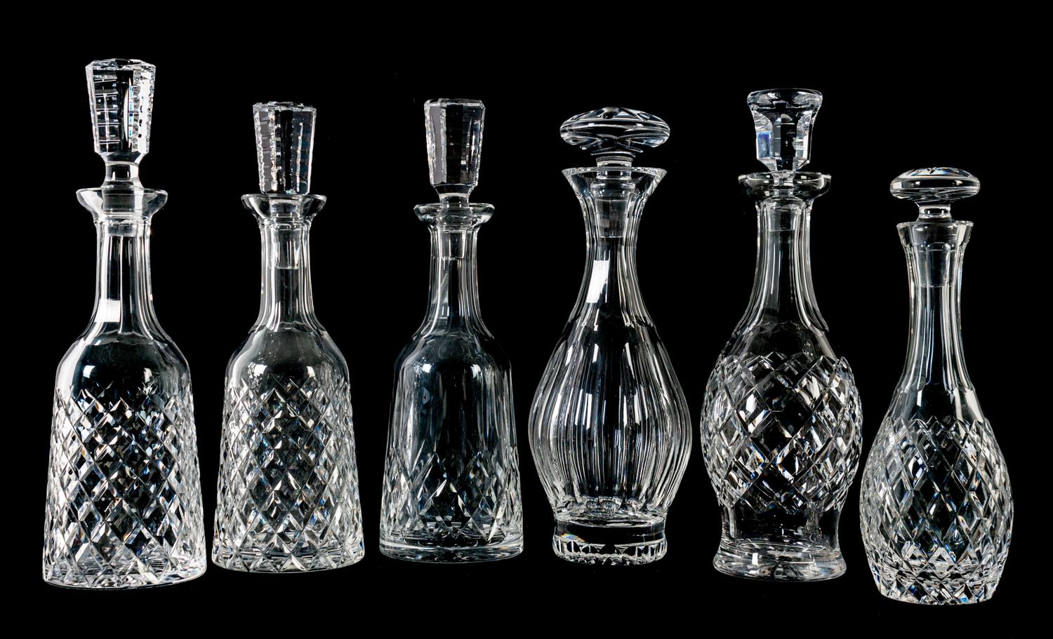 A Group of Six Waterford Glass Decanters Height of tallest 13 1/4 inches. — 20TH CENTURY