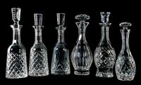 A Group of Six Waterford Glass Decanters Height of tallest 13 1/4 inches. — 20TH CENTURY